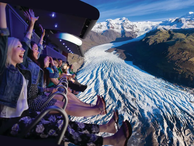 Riders soaring over a breathtaking view of Iceland